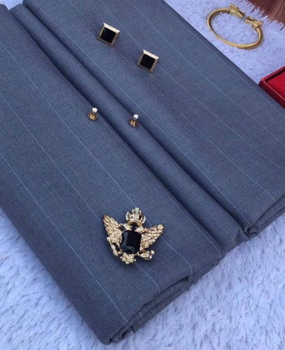 Prix un complet en tissu homme