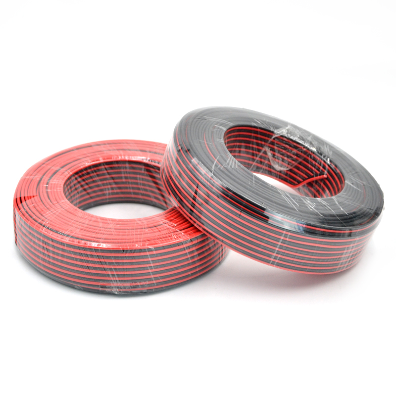câble d'enceinte bicolore rouge et noir de la marque KmtStyle, présenté sous forme de bobine.Détails du produitType : Câble de haut-parleur 60 mètres par bobine CCS (Copper-Clad Steel / Ac
