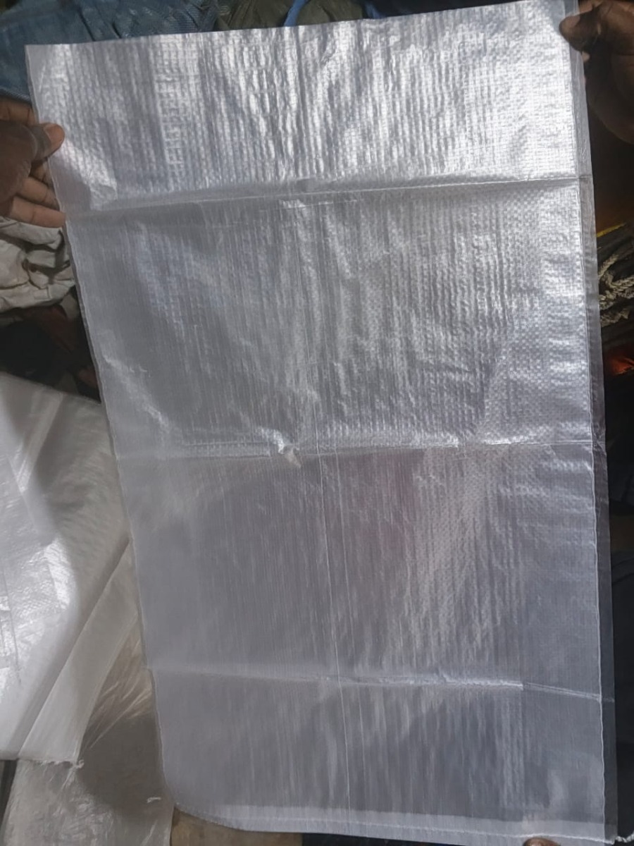 sac tissé en polypropylène (PP) 5kg transparent, présenté ici sous forme de pièce plate ou de sac vide avant assemblage.